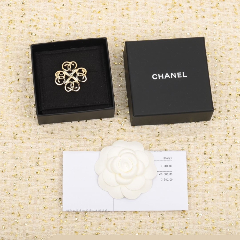 Ch*el brooches